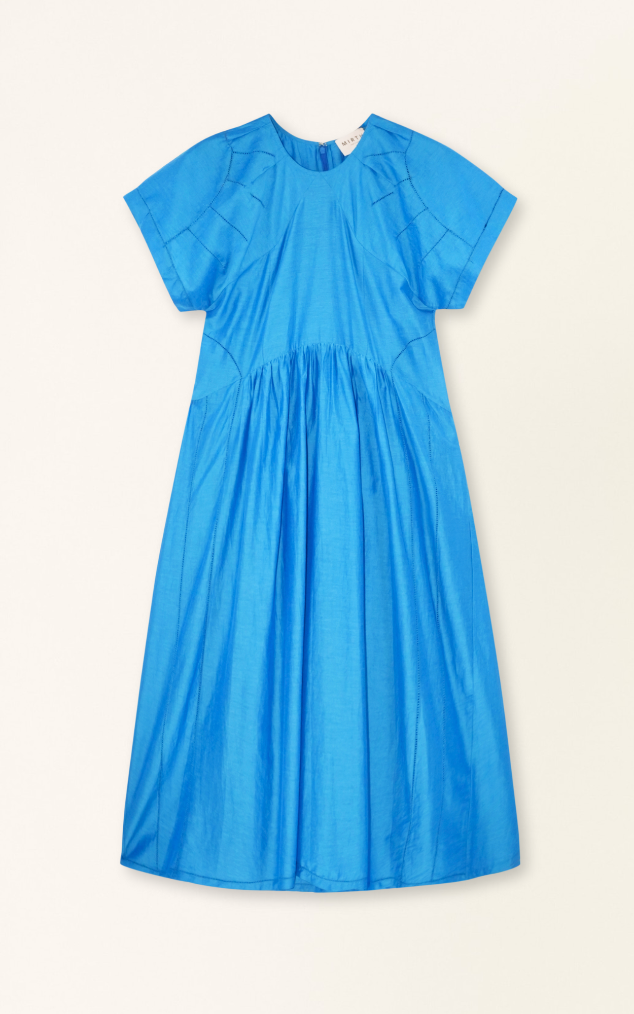 Blue cotton dress on a hanger in store
