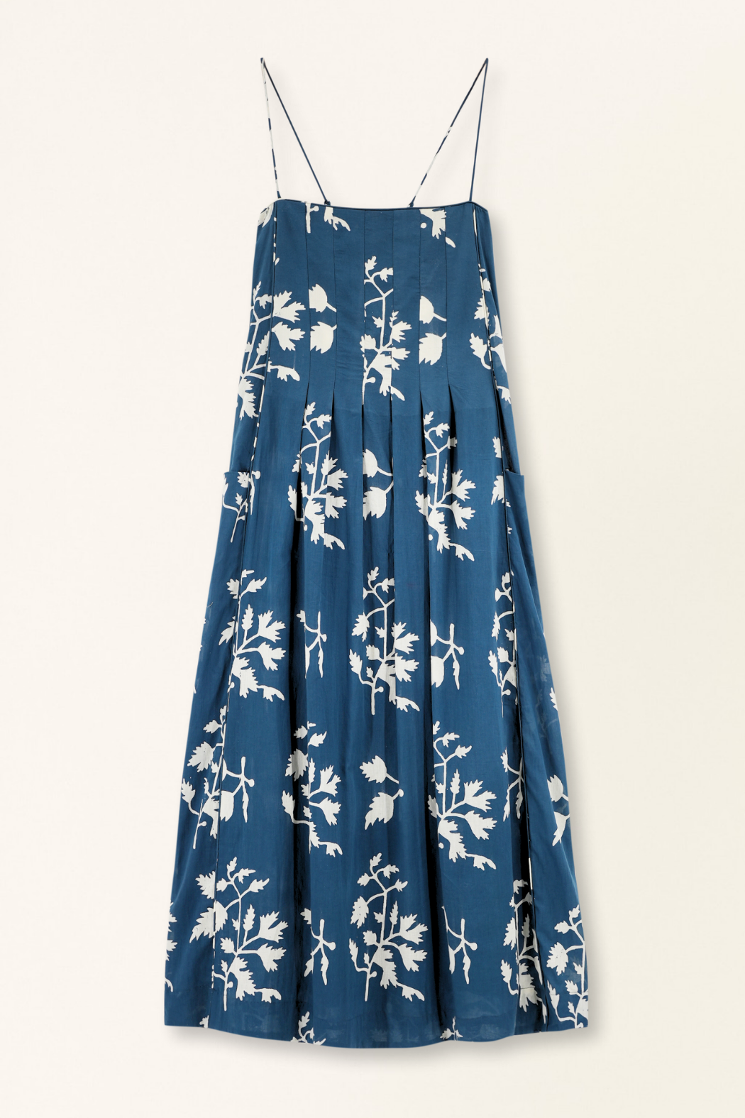 Blue cotton maxi dress on a hanger in store
