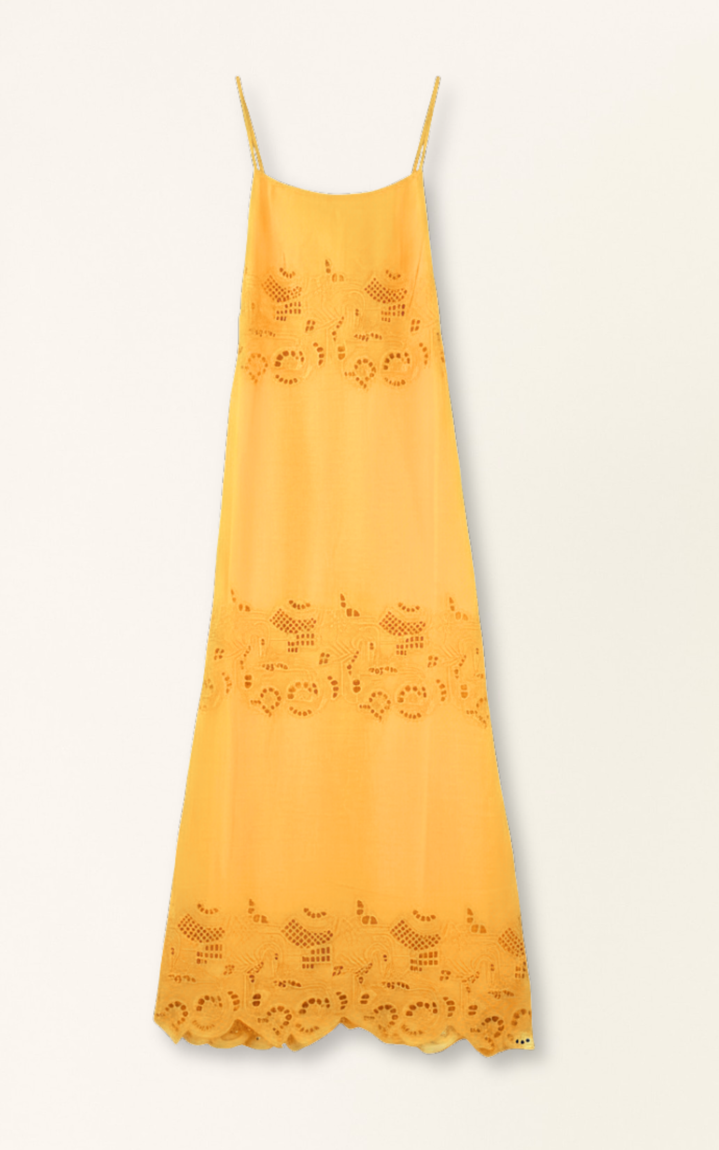 Yellow cotton maxi dress on a hanger in store