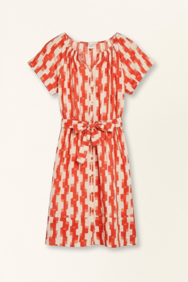 Red cotton short dress on a hanger in store