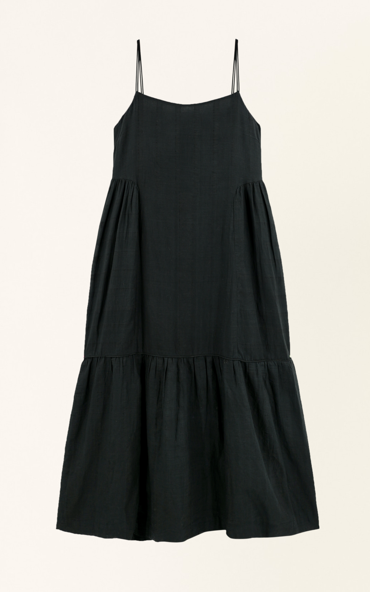 Black cotton maxi dress on a hanger in store