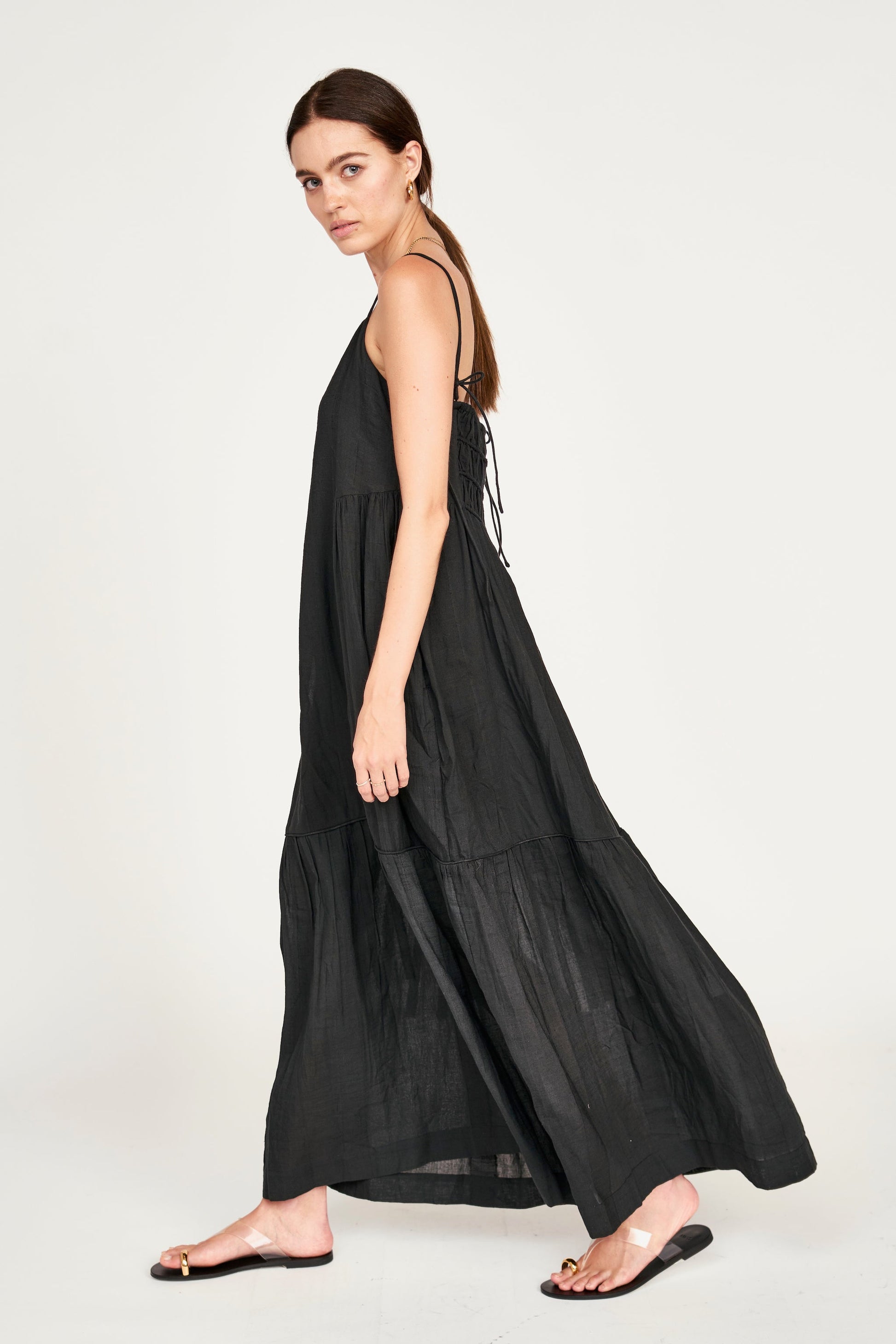 Black cotton maxi dress on a hanger in store
