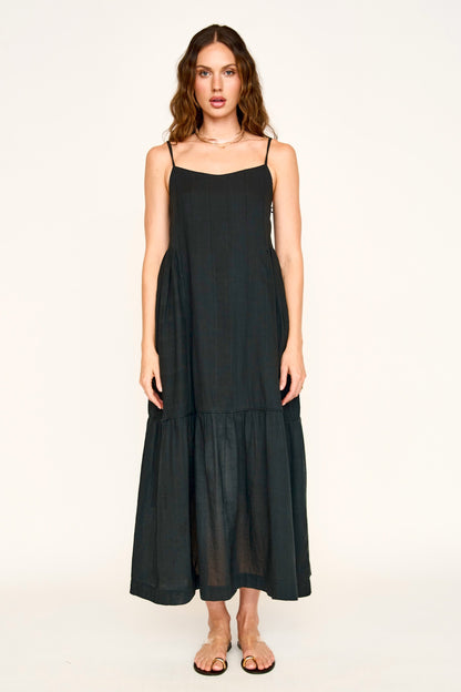 Black cotton maxi dress on a hanger in store
