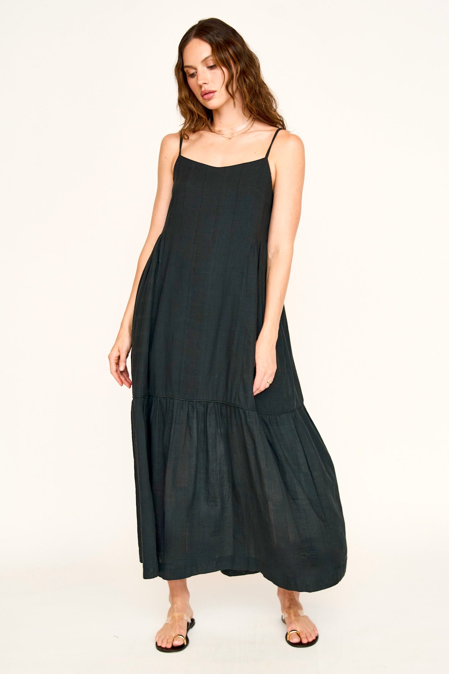 Black cotton maxi dress on a hanger in store