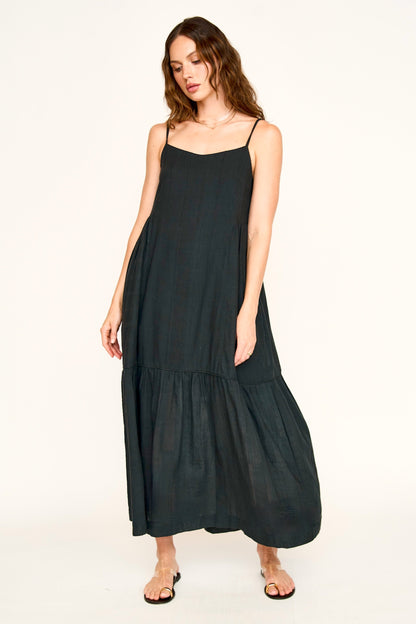 Black cotton maxi dress on a hanger in store