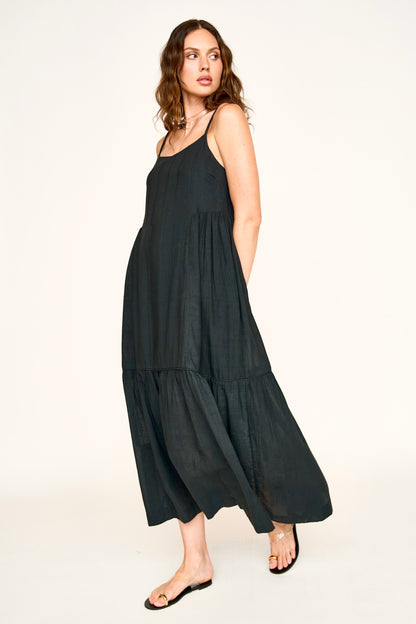 Black cotton maxi dress on a hanger in store