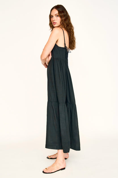 Black cotton maxi dress on a hanger in store