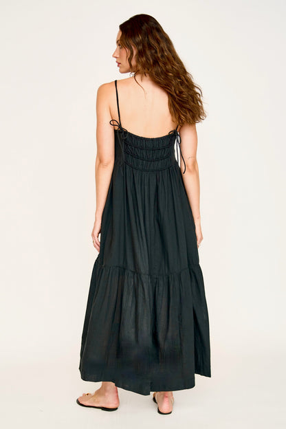 Black cotton maxi dress on a hanger in store