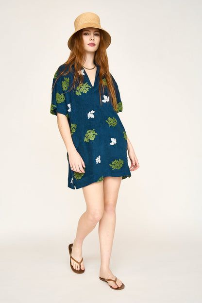 Terry short dress on a hanger in store