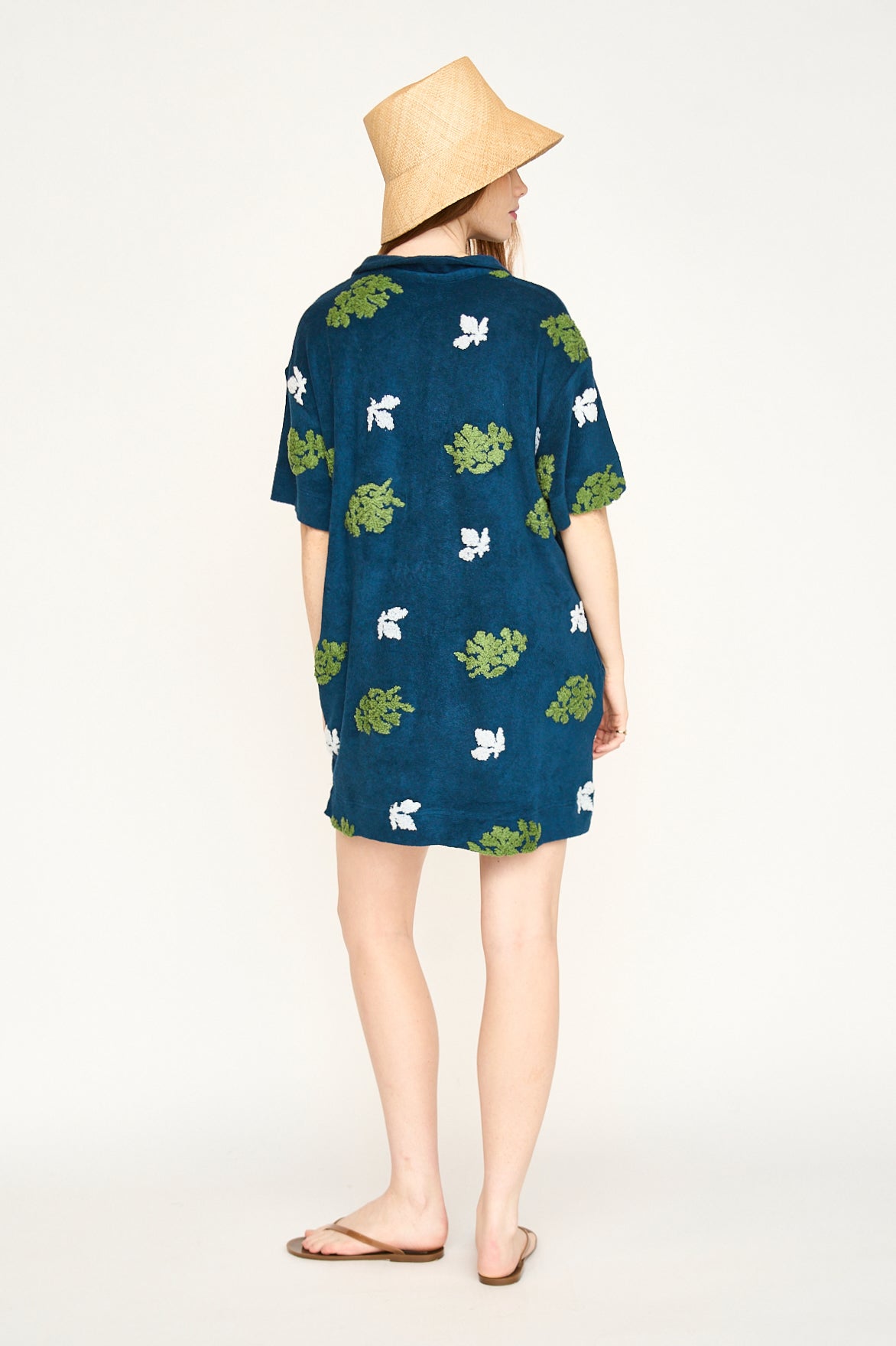 Terry short dress on a hanger in store