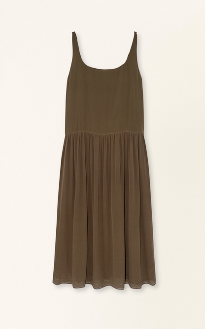 Brown silk midi dress on a hanger in store
