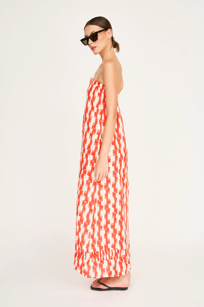 Red cotton maxi dress on a hanger in store