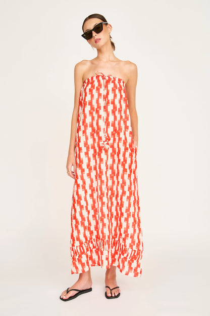 Red cotton maxi dress on a hanger in store