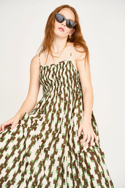 Brown cotton maxi dress on a hanger in store
