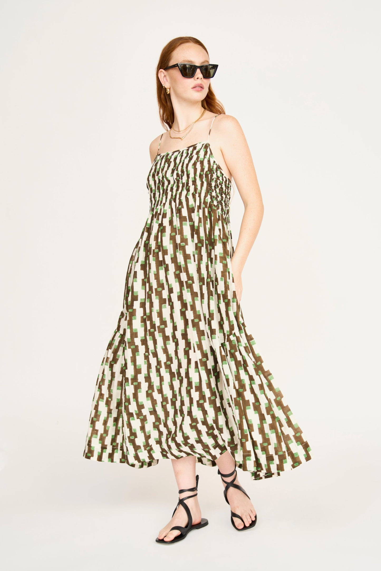 Brown cotton maxi dress on a hanger in store
