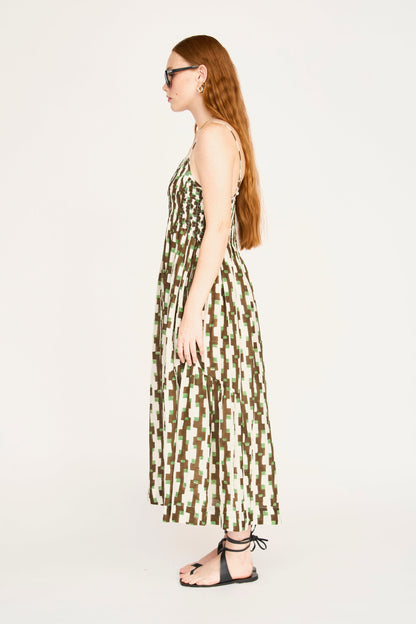 Brown cotton maxi dress on a hanger in store