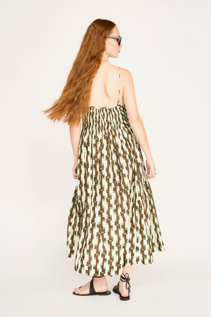 Brown cotton maxi dress on a hanger in store