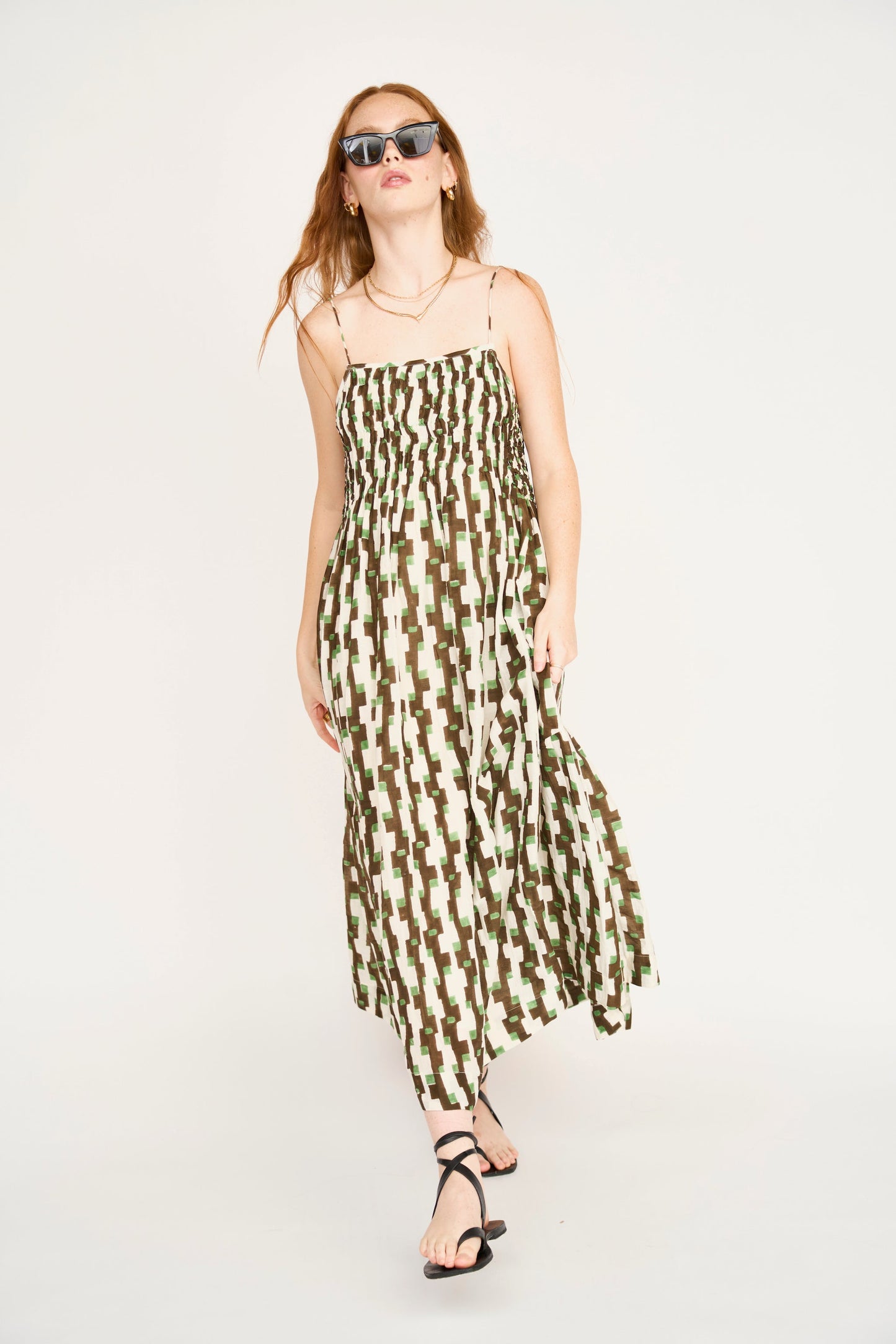 Brown cotton maxi dress on a hanger in store