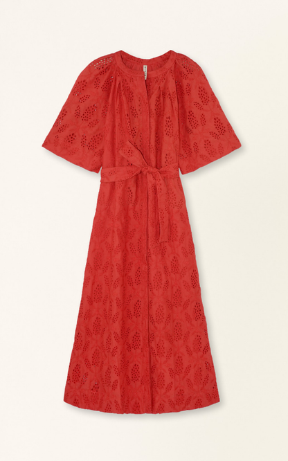 Red eyelet maxi dress on a hanger in store