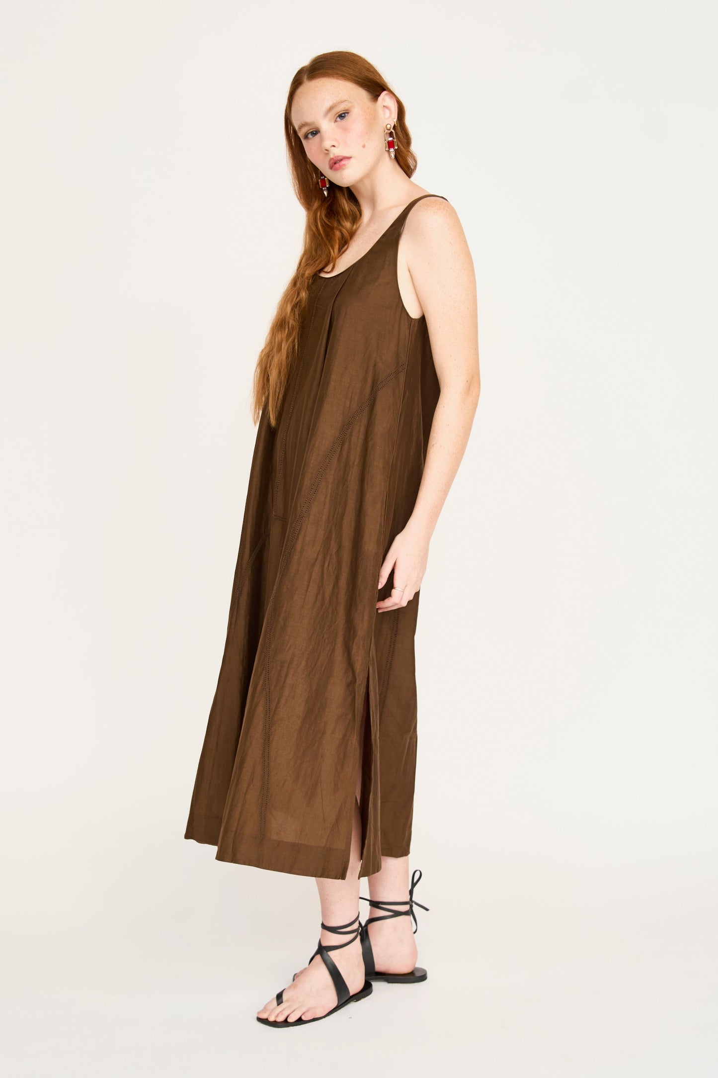 Brown cotton dress on a hanger in store