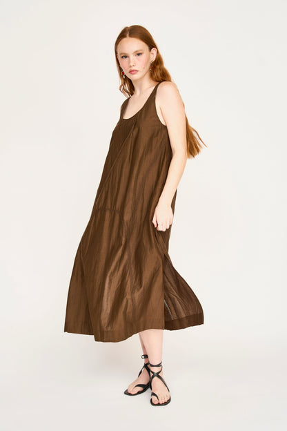 Brown cotton dress on a hanger in store