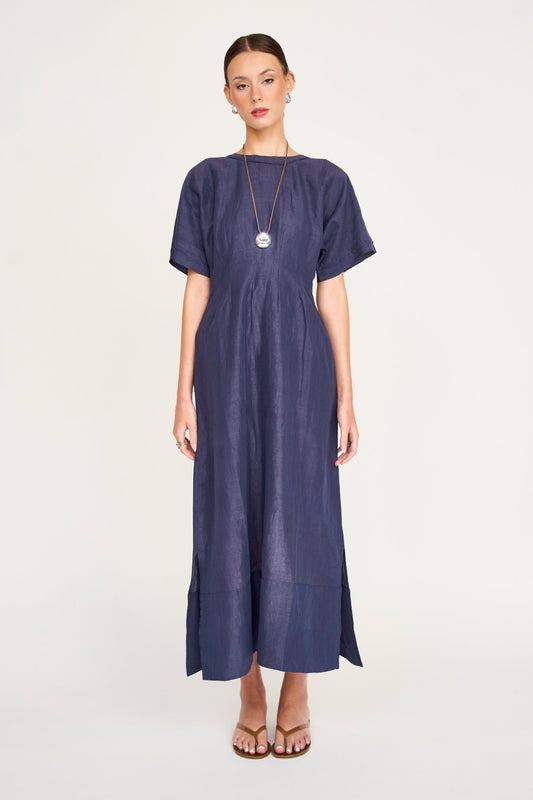 Blue linen maxi dress on a hanger in store