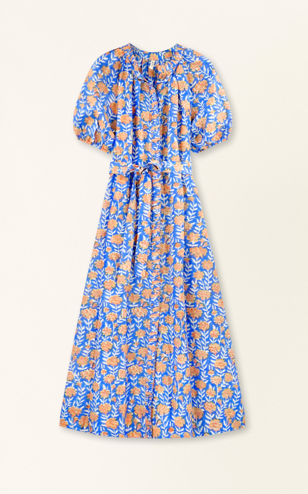 Pink cotton maxi dress on a hanger in store