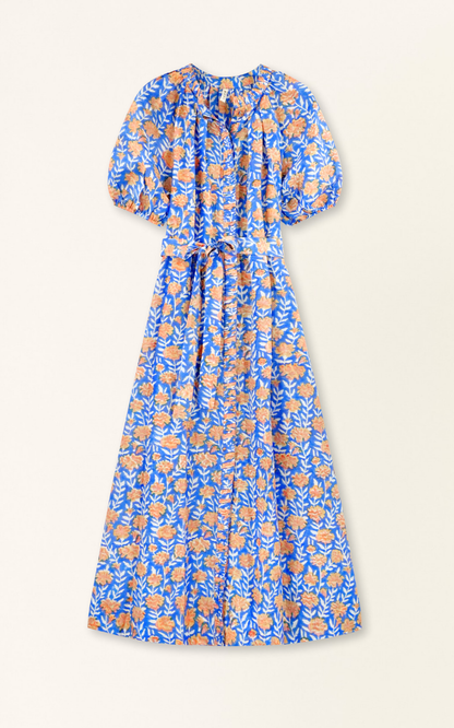 Pink cotton maxi dress on a hanger in store