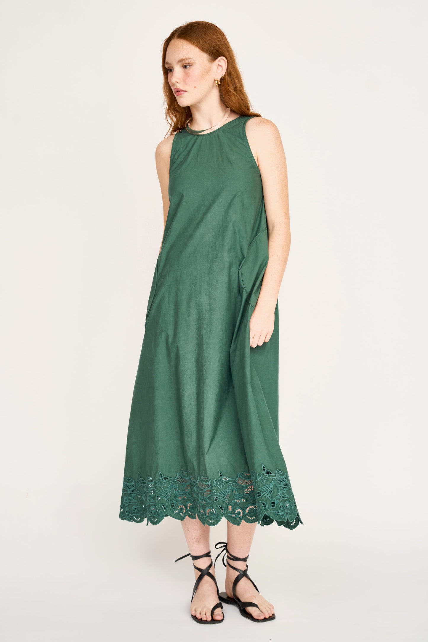 Cotton midi dress on a hanger in store