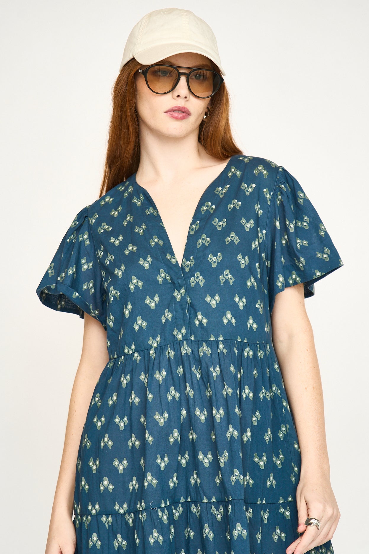 Cotton short dress on a hanger in store