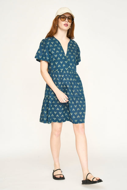 Cotton short dress on a hanger in store