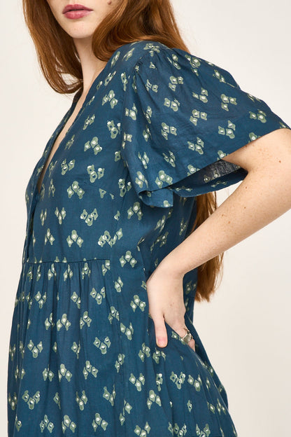 Cotton short dress on a hanger in store
