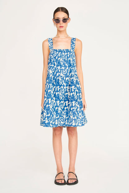 Indigo cotton short dress on a hanger in store