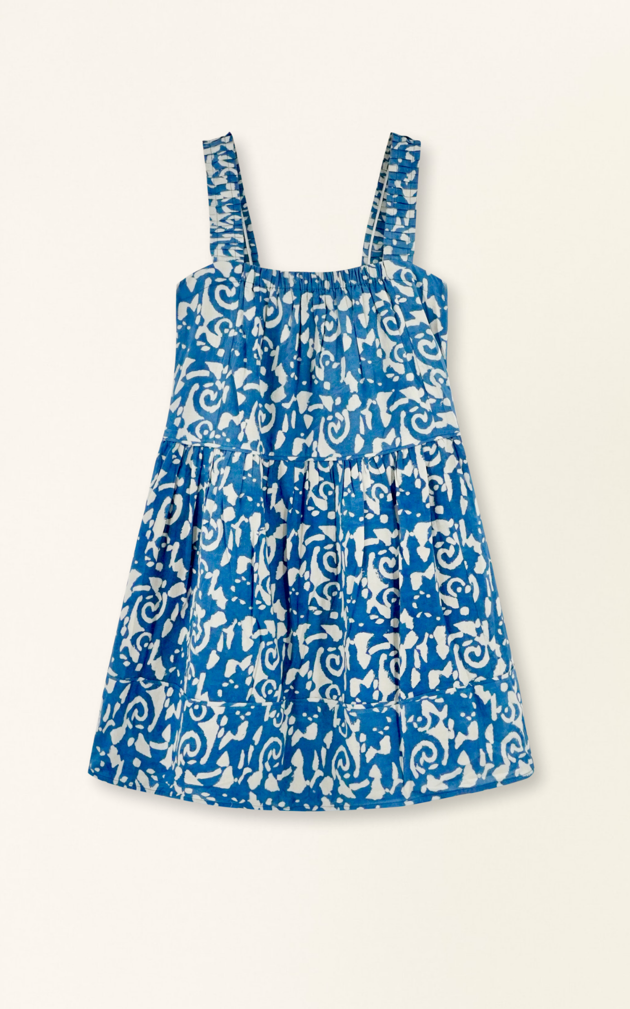 Indigo cotton short dress on a hanger in store
