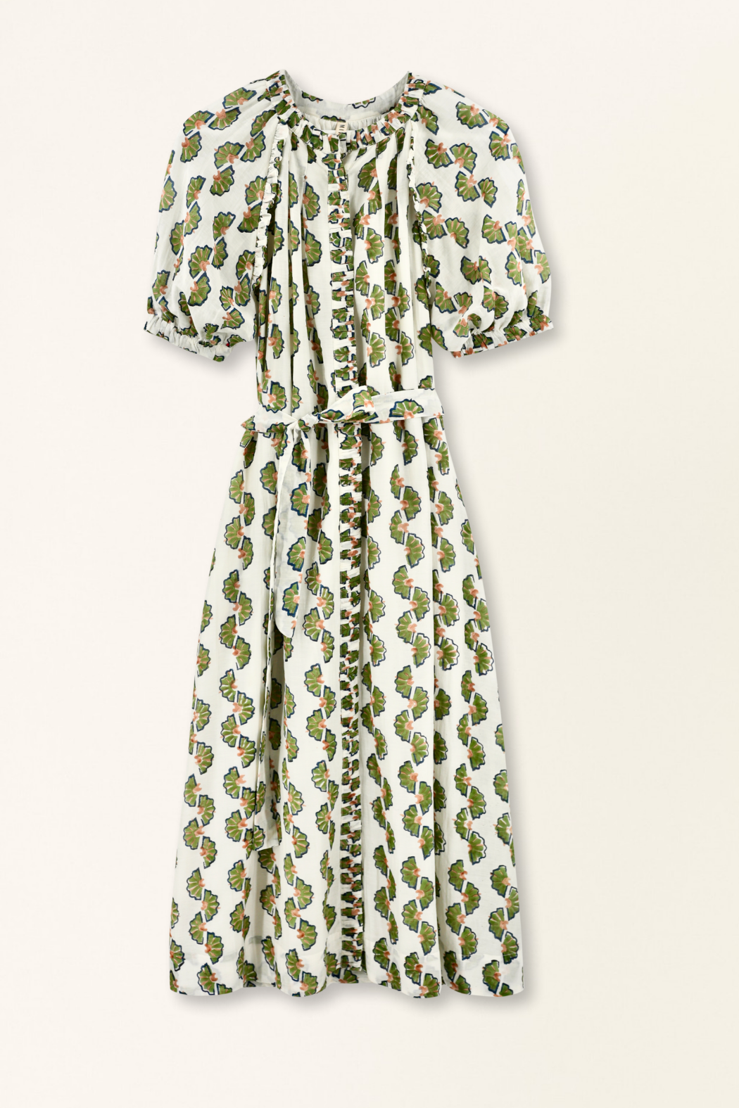 Green cotton maxi dress on a hanger in store