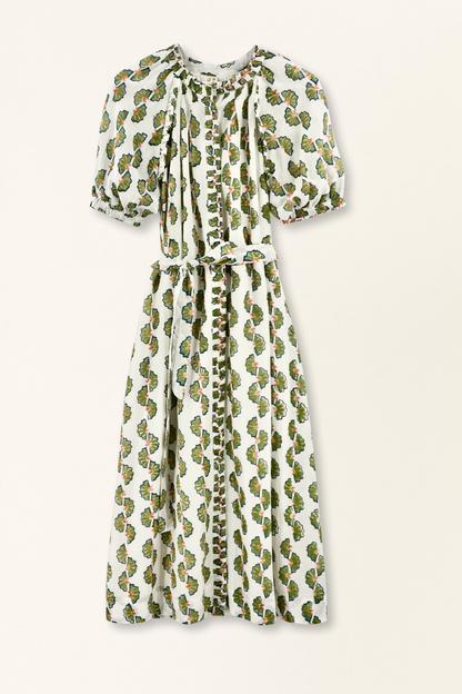 Green cotton maxi dress on a hanger in store