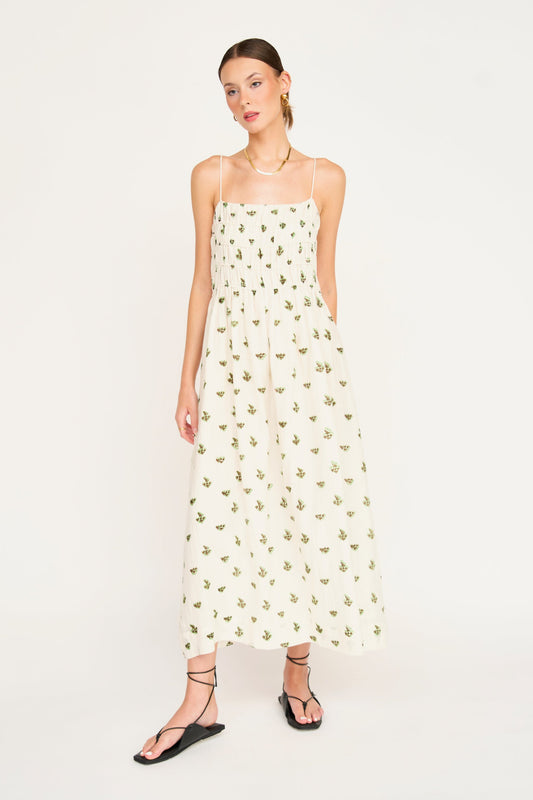 Brown cotton midi dress on a hanger in store