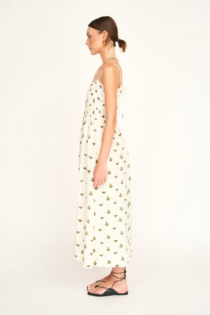 Brown cotton midi dress on a hanger in store
