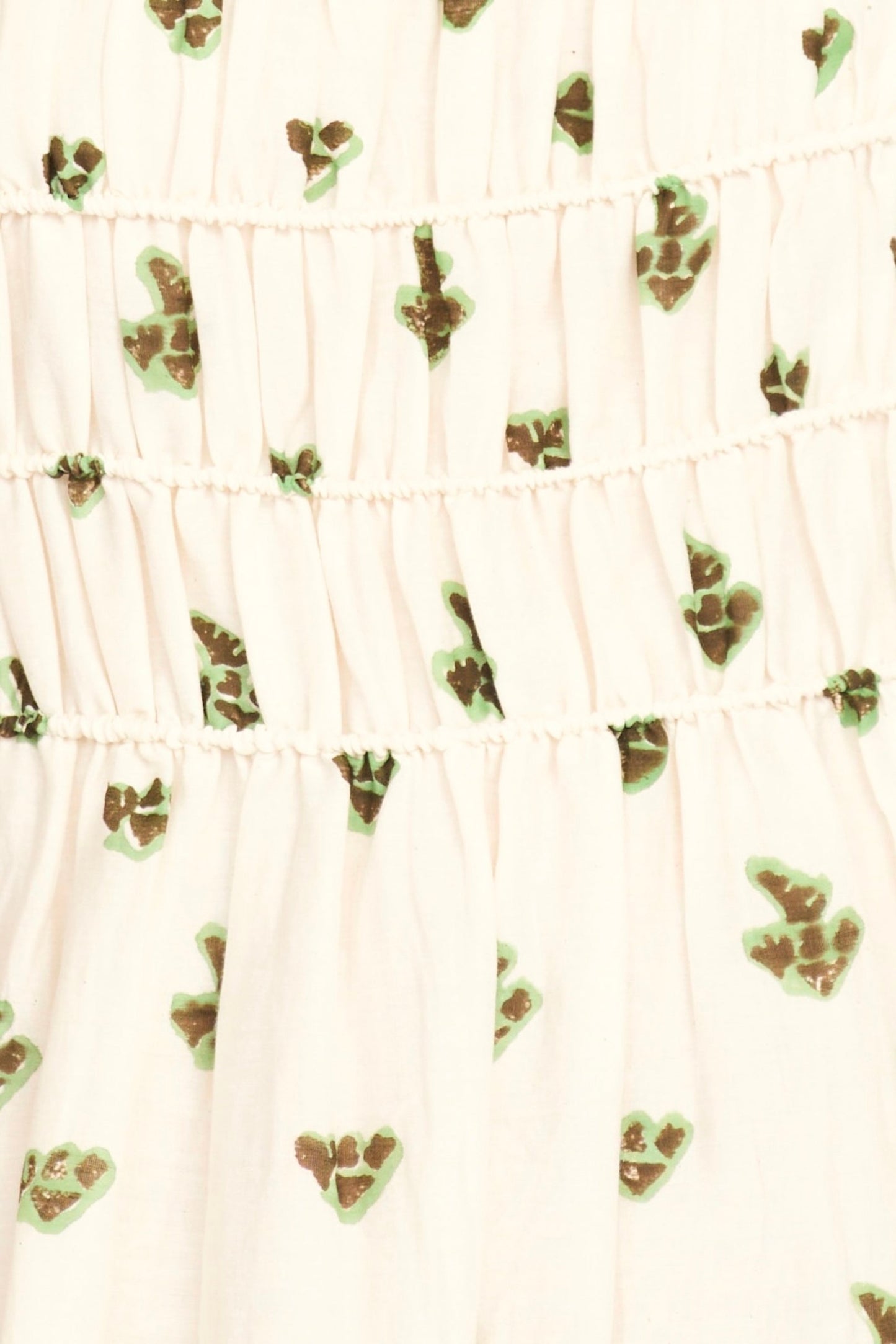 Brown cotton midi dress on a hanger in store