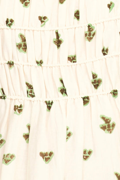 Brown cotton midi dress on a hanger in store