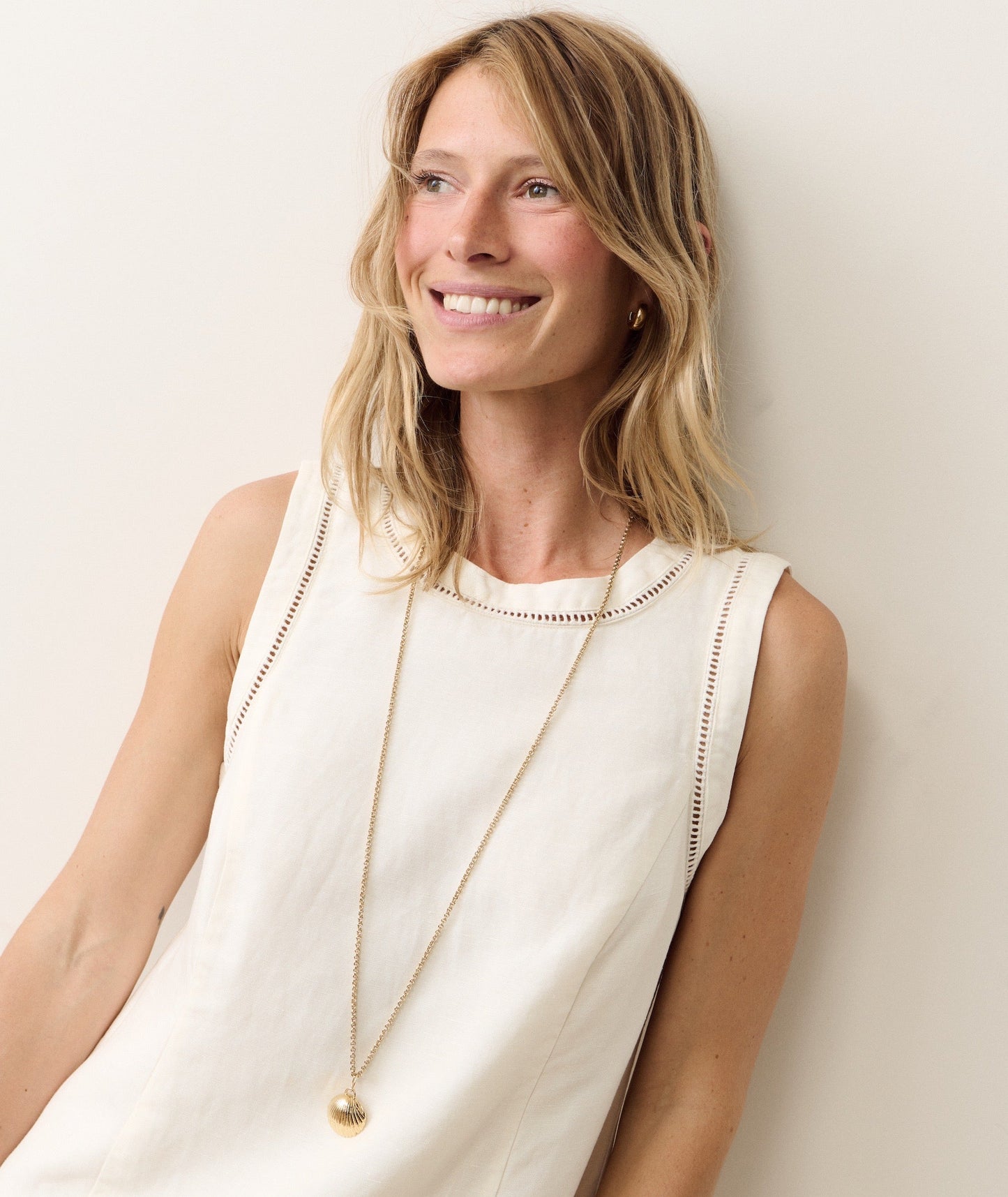 Linen mini dress on a hanger in store