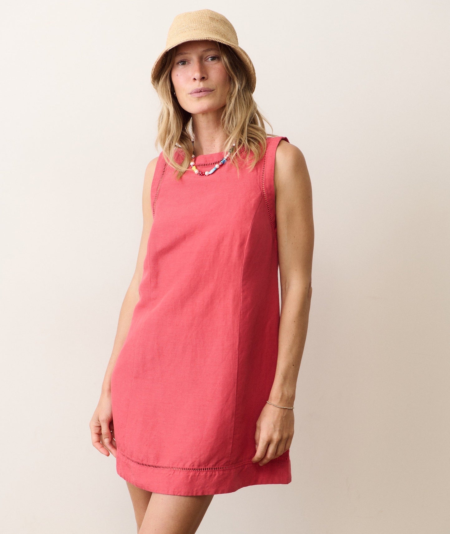 Linen mini dress on a hanger in store