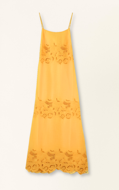Yellow cotton maxi dress on a hanger in store