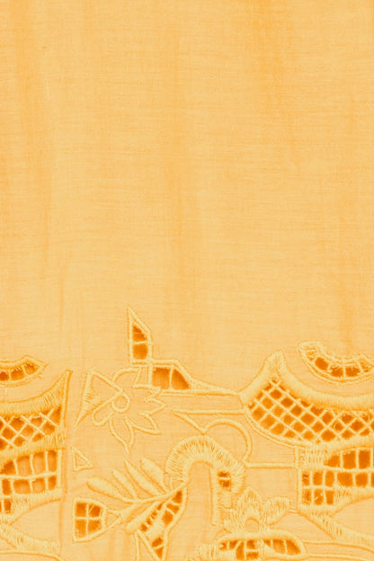 Yellow cotton maxi dress on a hanger in store