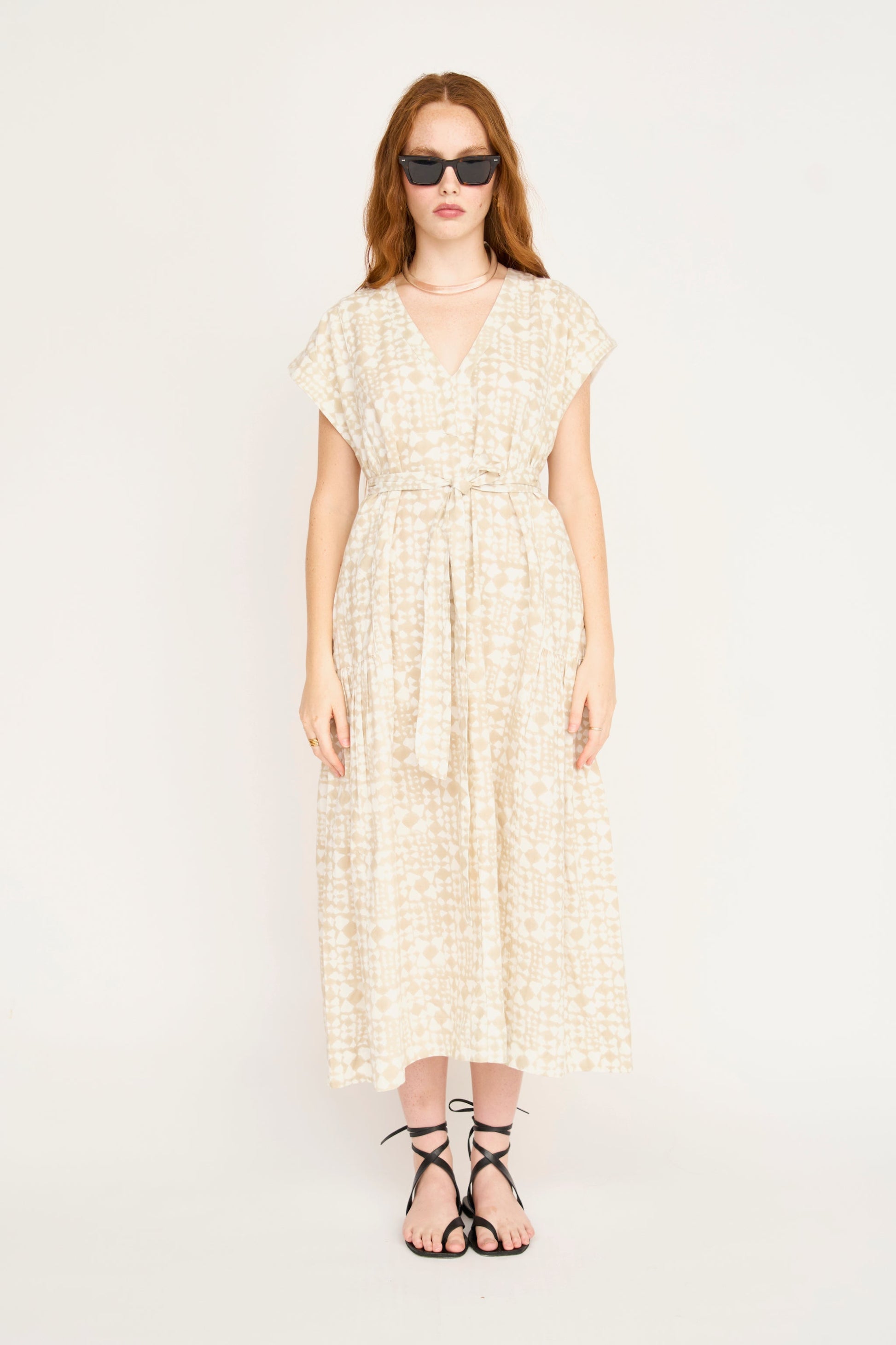 Cotton midi dress on a hanger in store
