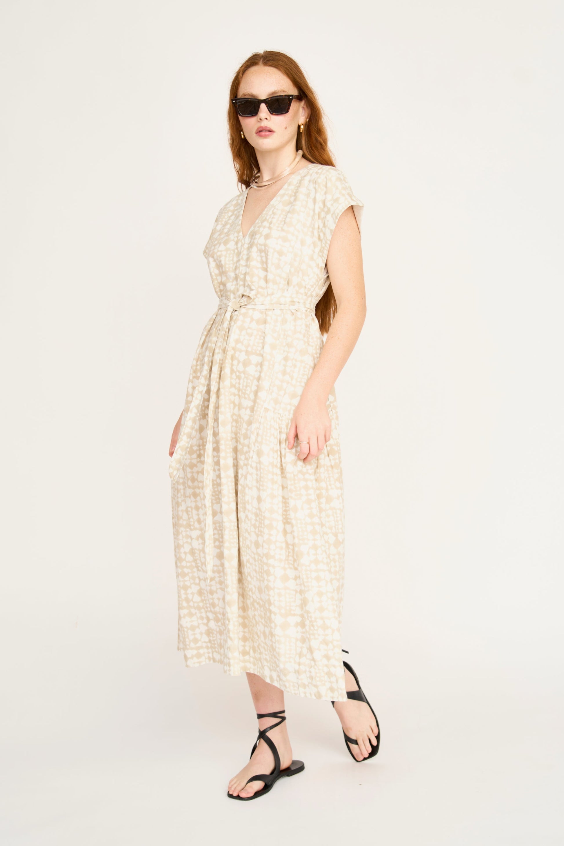 Cotton midi dress on a hanger in store