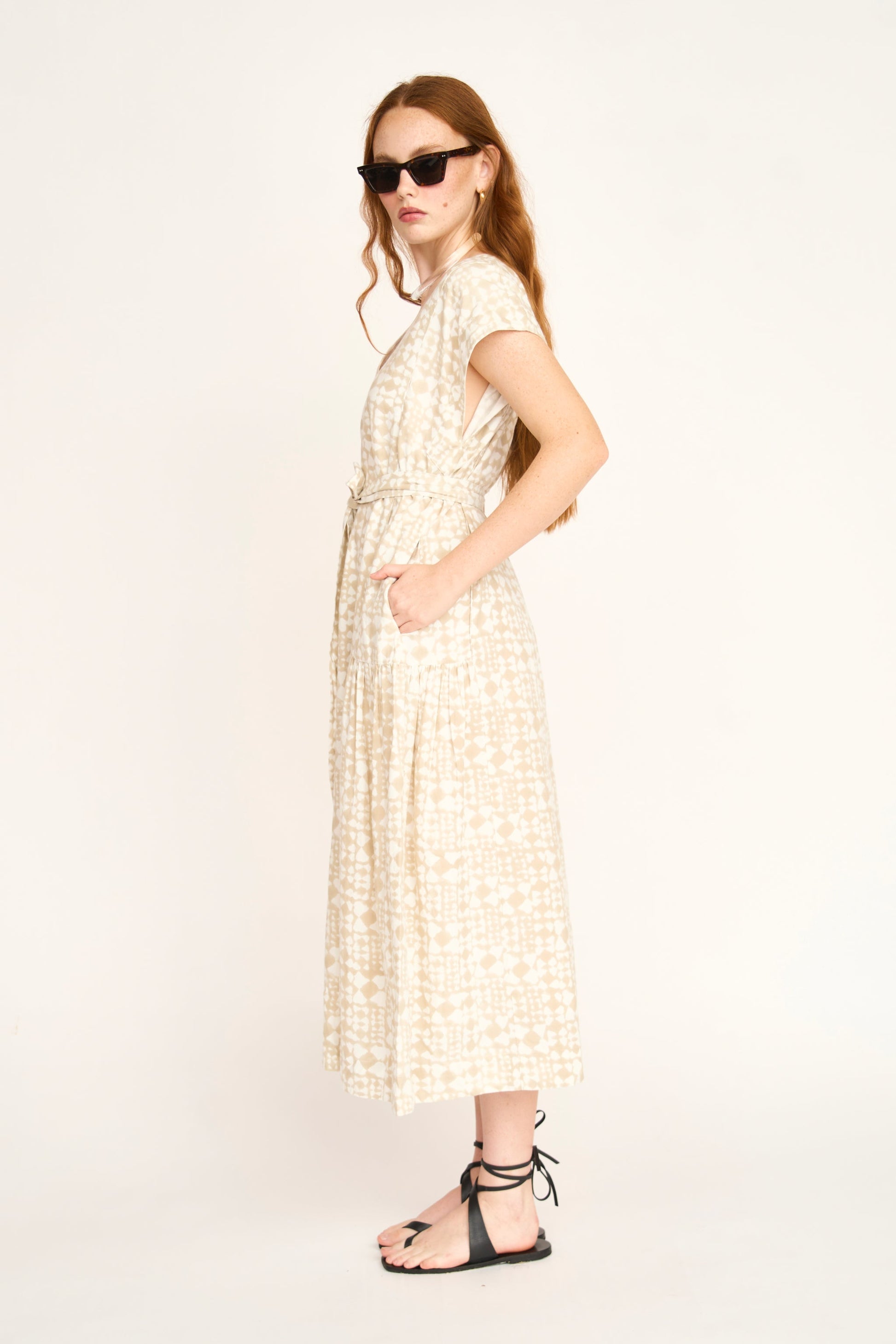 Cotton midi dress on a hanger in store