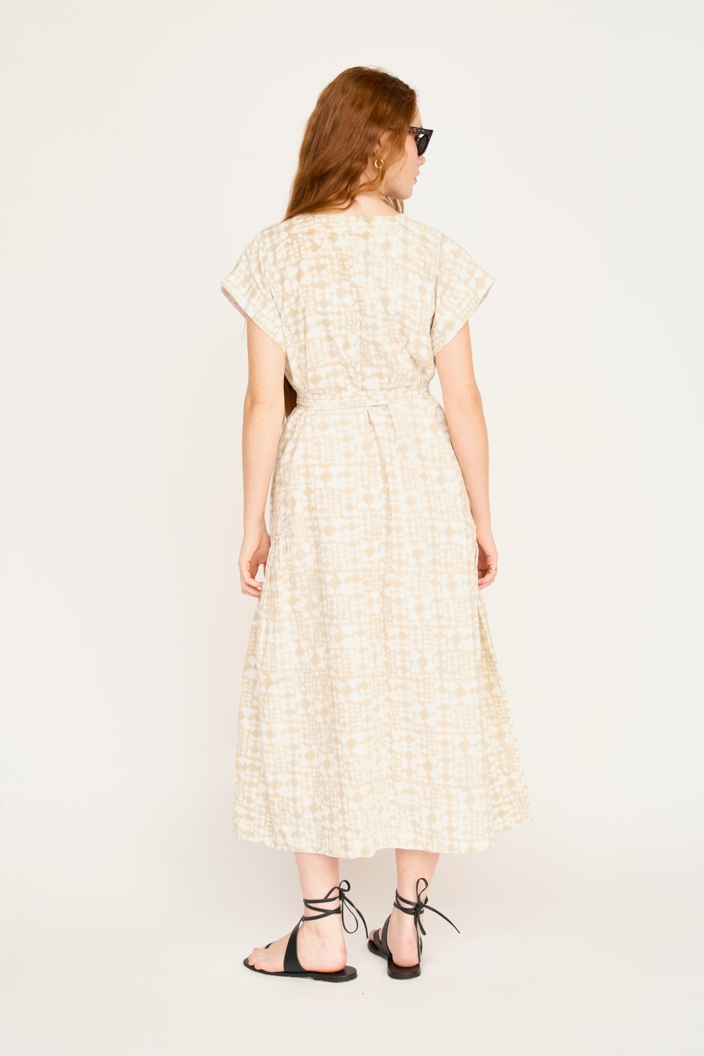 Cotton midi dress on a hanger in store
