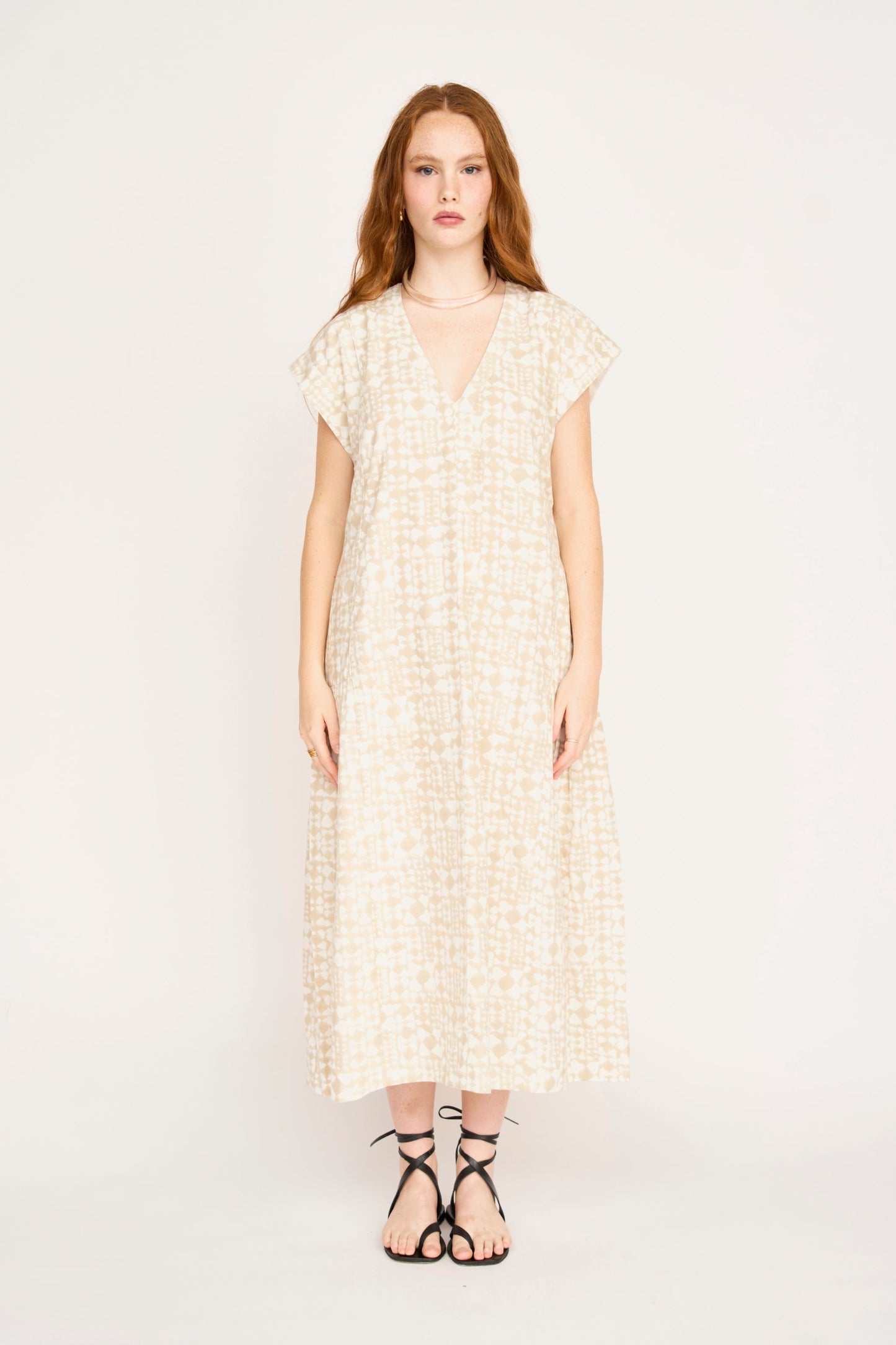 Cotton midi dress on a hanger in store