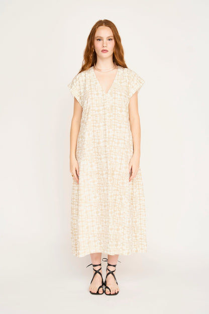 Cotton midi dress on a hanger in store
